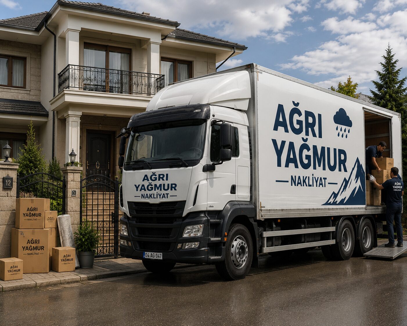 Ağrı Yağmur Nakliyat kamyonu ev önünde eşya yüklüyor
